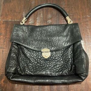 VERY Gently Loved and Elegant Yves Saint Laurent Roady Flap Black Leather Bag